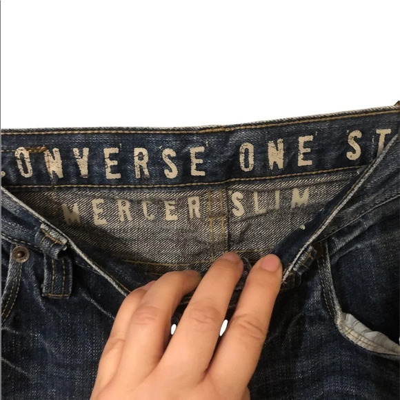 Distressed slim fit tapered jean - Picture 5 of 9